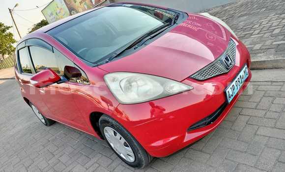 Nunua Ilio tumika Honda Fit Nyekundu Gari ndani ya Maputo nchini Maputo