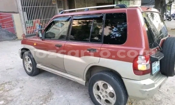 Comprar Usado Mitsubishi Pajero iO Vermelho Carro em Maputo em Maputo Comprar Usado Mitsubishi Pajero iO Vermelho Carro em Maputo em Maputo