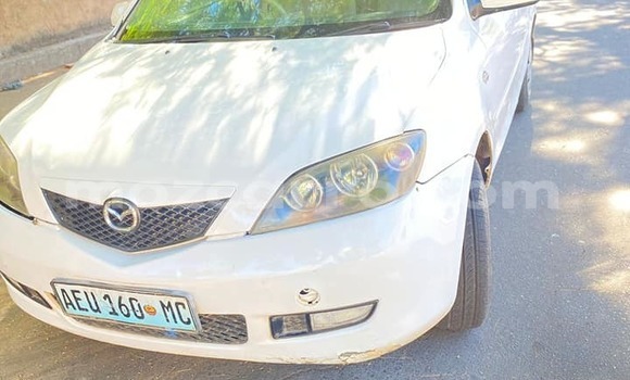 Comprar Usado Mazda Demio Branco Carro em Búzi em Sofala