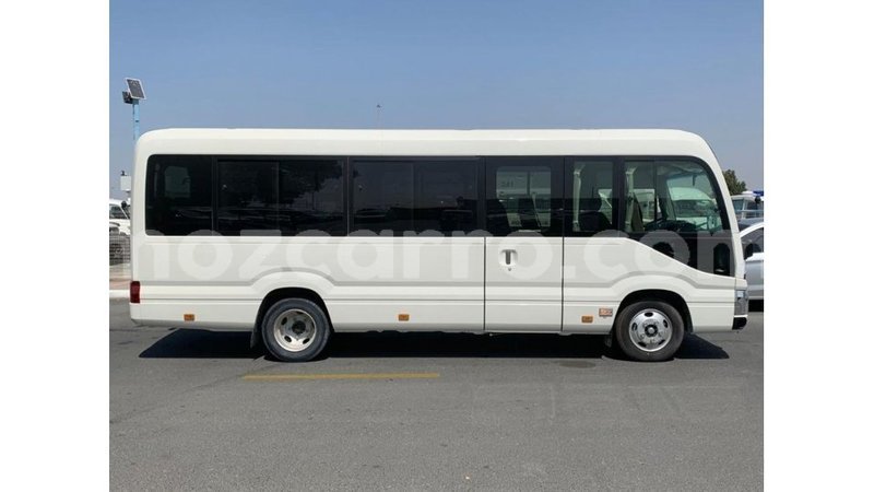 Big with watermark toyota coaster cabo delgado import dubai 7501