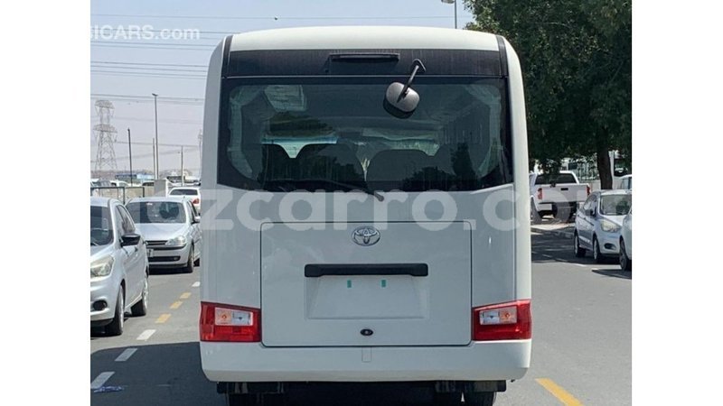 Big with watermark toyota coaster cabo delgado import dubai 7501