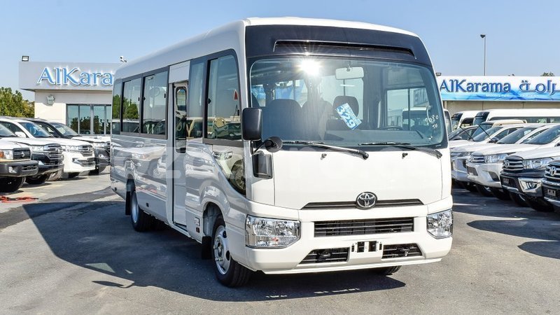 Big with watermark toyota coaster cabo delgado import dubai 7801