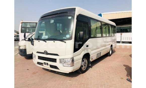 Comprar Importar Toyota Coaster Branco Carro em Import - Dubai em Cabo Delgado