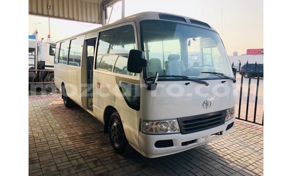 Comprar Importar Toyota Coaster Branco Carro em Import - Dubai em Cabo Delgado