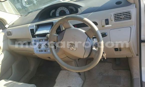 Buy Used Toyota Raum White Car in Maputo in Maputo Buy Used Toyota Raum White Car in Maputo in Maputo